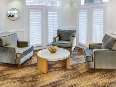 Cozy common area with chairs and a table