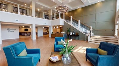 Bright and welcoming lobby area with seating and decor