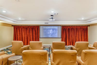Interior view of a cozy theater room with seating