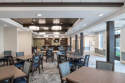 Bright dining room with tables and chairs