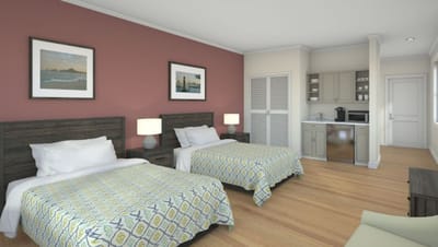 Comfortable resident room with two beds and kitchenette