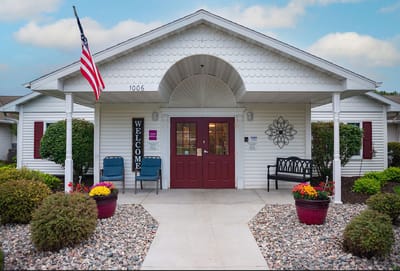 Exterior view of the facility entrance with landscaping