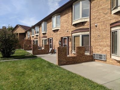 Exterior view of residential units with green space