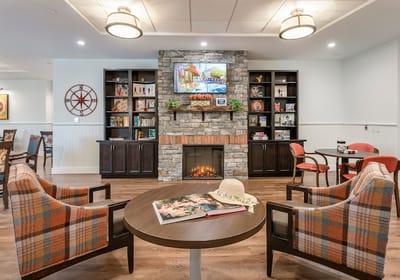Cozy common area with seating and a fireplace