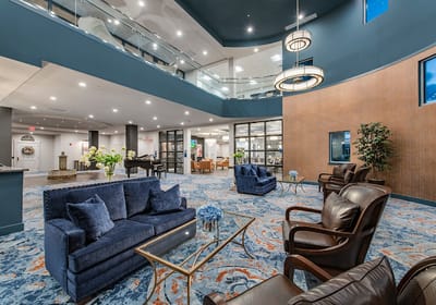 Bright interior showing a comfortable common area with seating