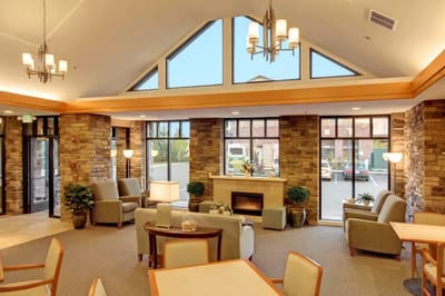 Bright and modern common area with seating and large windows