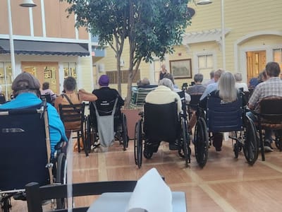 Residents attending an activity in the common area