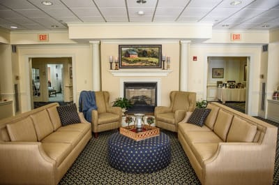 Cozy common area with seating and fireplace