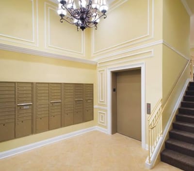 Interior hallway with elevator and mailboxes
