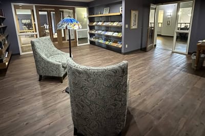 Interior view of a cozy common area with seating