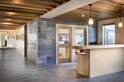 Bright interior of a reception area with wooden accents