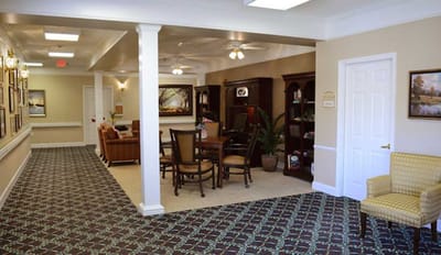 Bright common area with seating and artwork