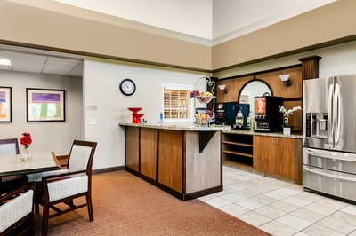 Interior view of a cozy dining area with a coffee station