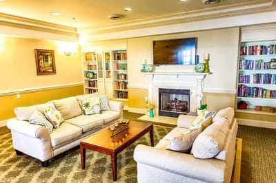 Common area with seating and a fireplace