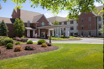 Exterior view of Mount Alverna Village entrance and landscaping