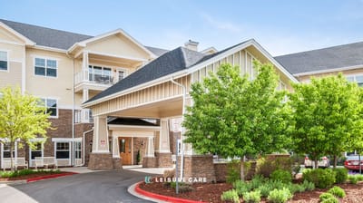 Entrance of New Dawn Memory Care with landscaping