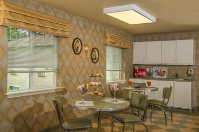 Bright dining area with refreshments and desserts