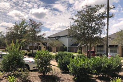 Exterior view of Oak Park Village with landscaping