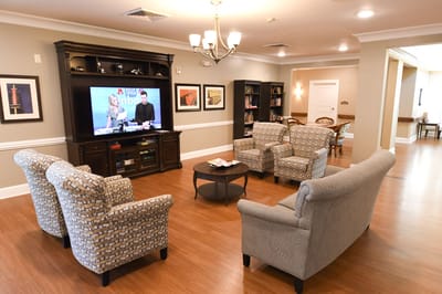 Common area with seating and television
