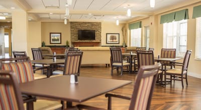 Brightly lit dining area with seating