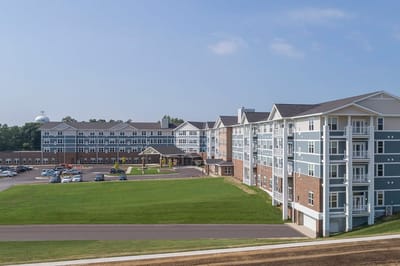 Building exterior of Overlook Village with landscaping