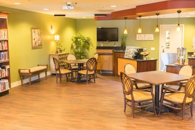 Interior common area with tables and chairs