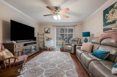Cozy living room with comfortable seating and TV