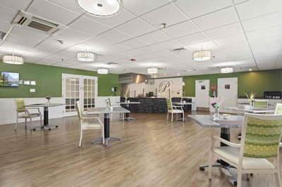 Bright dining area with tables and chairs
