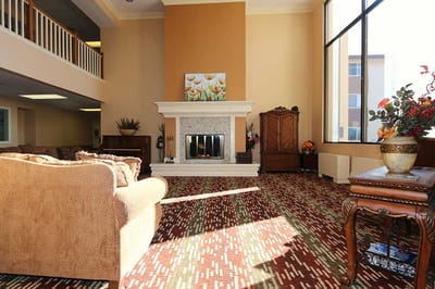 Common area with seating and a fireplace