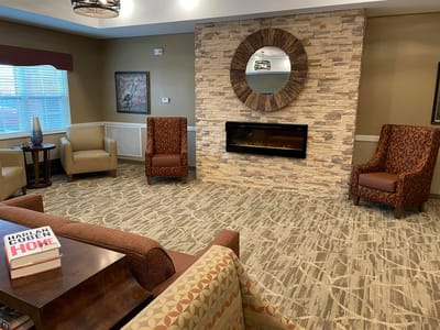 Cozy common area with seating and a fireplace