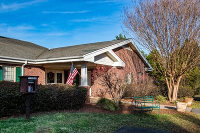 Exterior view of Preston House with outdoor seating