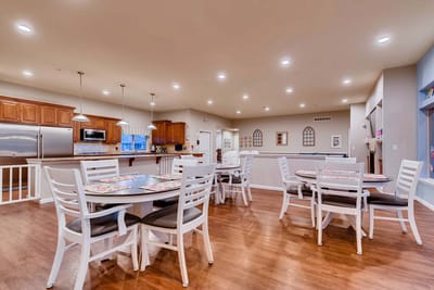Bright dining area with tables and chairs