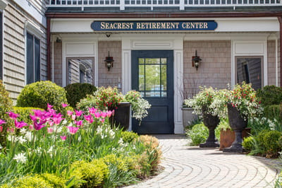 Front entrance of Seacrest Retirement Center with flowers