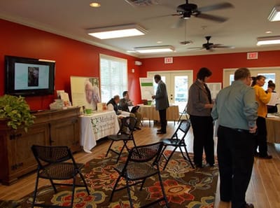 Residents and staff interacting in a common area