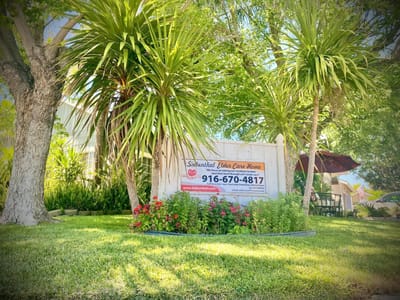 Exterior view of Siebenthal Elder Care Home signage