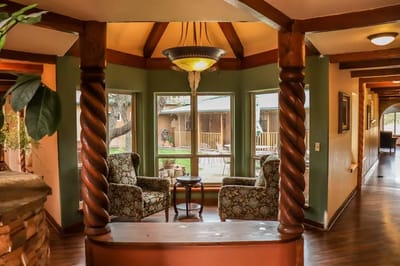 Interior common area with cozy seating and large windows