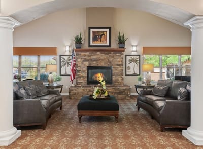 Cozy common area with seating and a fireplace