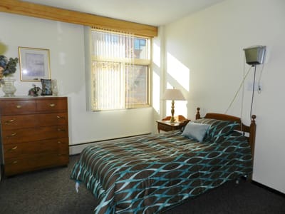 Cozy resident bedroom with window light