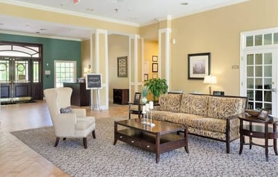 Spacious lobby area with seating and decor