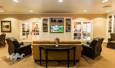 Cozy common area with comfortable seating and a television