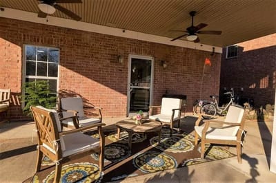 Outdoor seating area with chairs and a table
