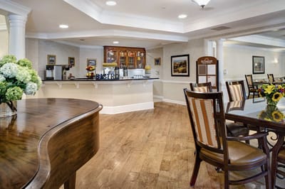 Interior of a common area with seating and a bistro counter
