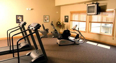 Fitness area with exercise equipment for residents
