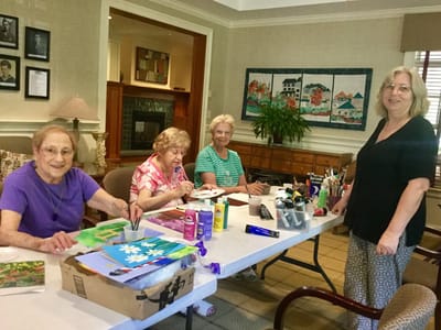 Residents engaging in an arts and crafts activity