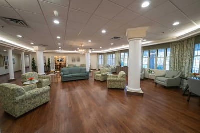 Bright common area with seating and natural light