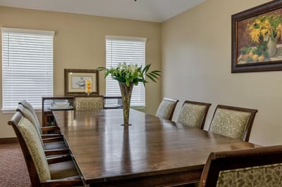 Interior dining room setup with a large table