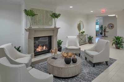 Cozy common area with seating and fireplace