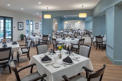 Dining room set for a meal service with elegant decor