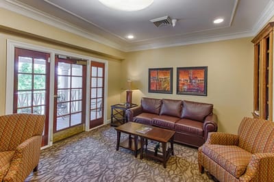 Cozy common area with seating and artwork