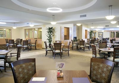 Bright dining room with tables and chairs